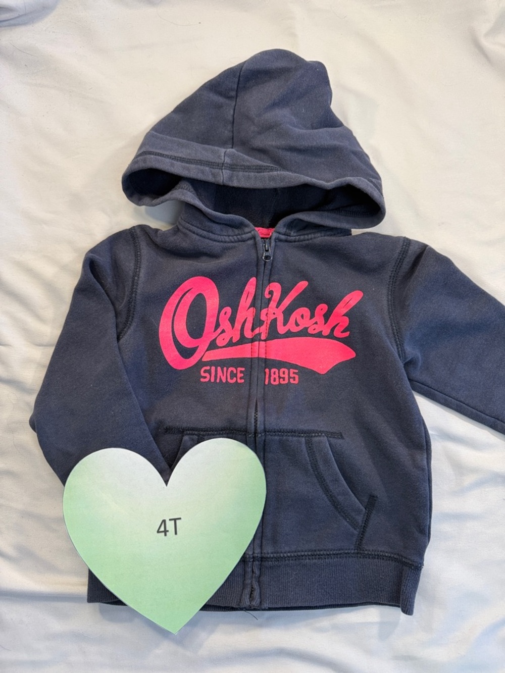 OshKosh B'gosh - Navy full zipped hoodie with pink/sparkle (slight) logo. Size 4